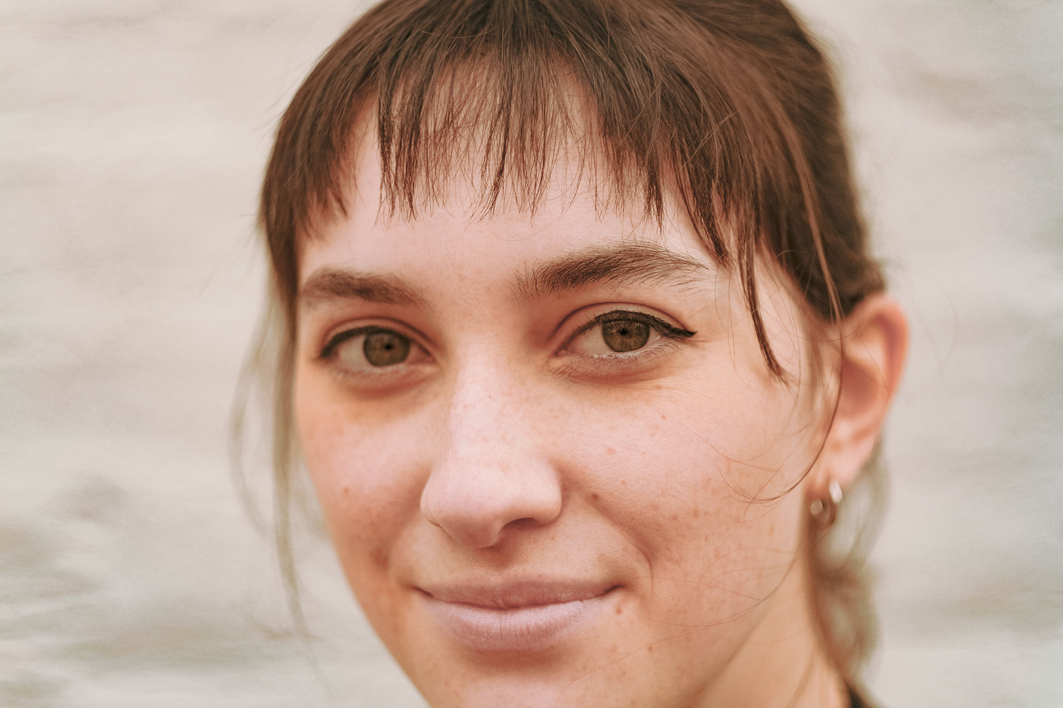 Photo of young woman with bangs